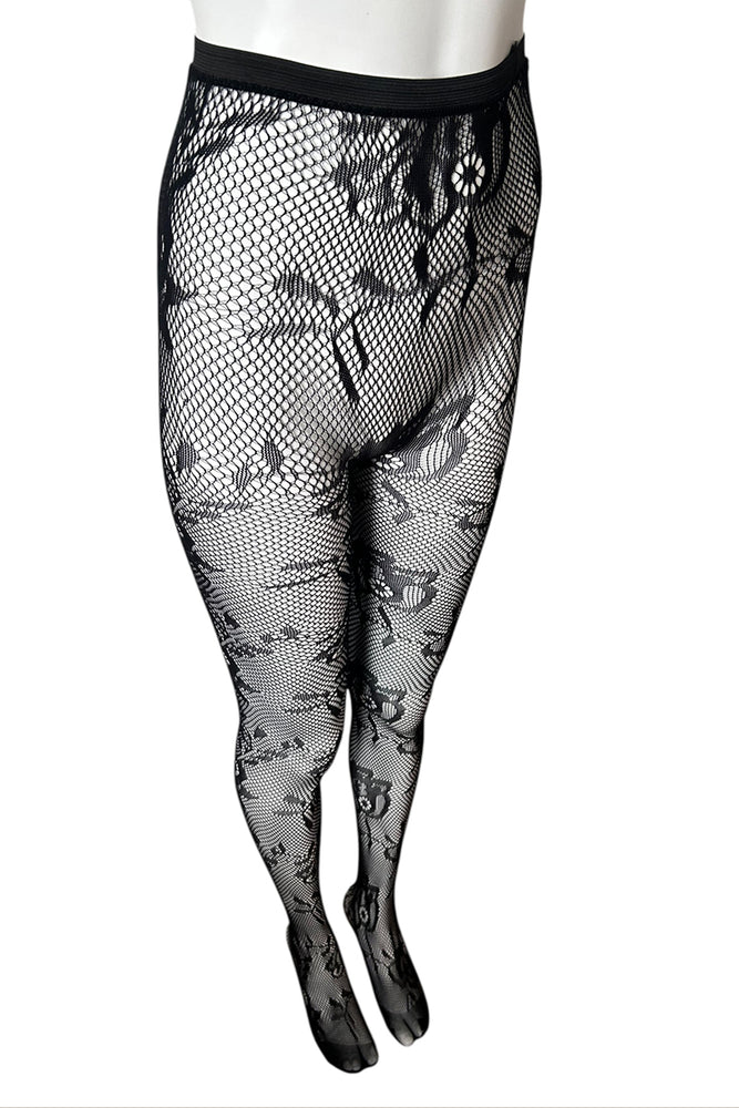 
                      
                        Black tights stockings with floral patterns on a white background
                      
                    