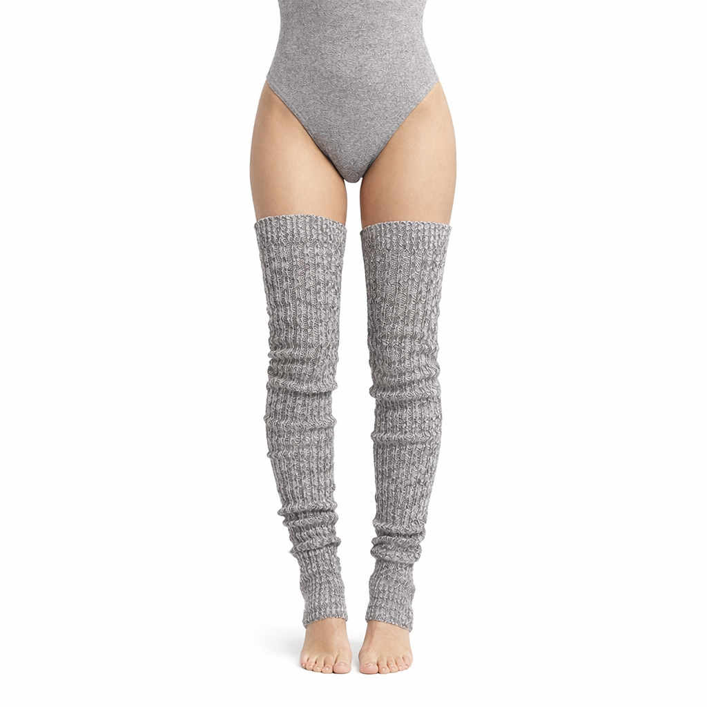 Gray knitted leg warmers worn with a gray bodysuit on a white background