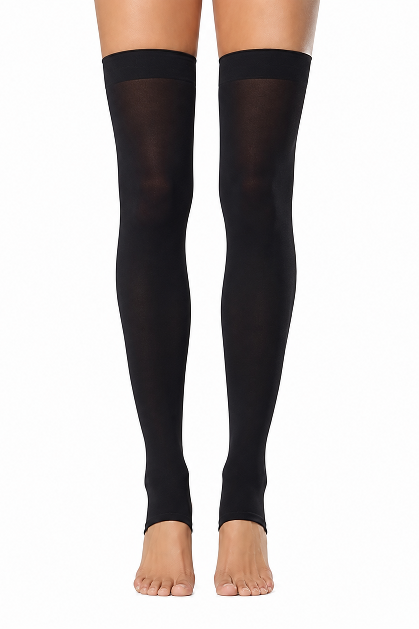 Black thigh-high compression stockings worn on a model's legs, shown against a plain white background.
