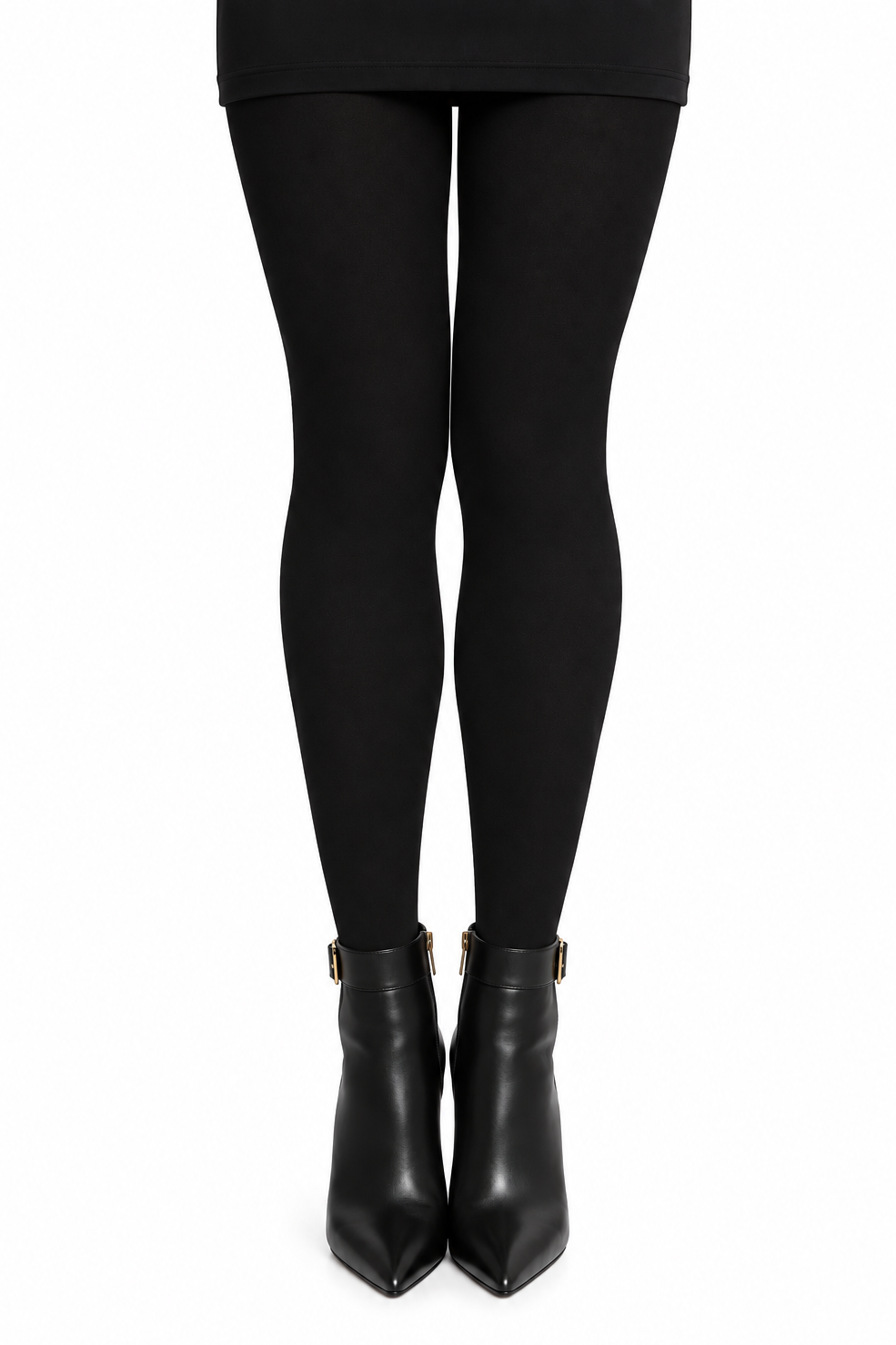 Black tights worn by a model, paired with black pointed-toe ankle boots featuring gold-tone hardware, shown against a plain white background.