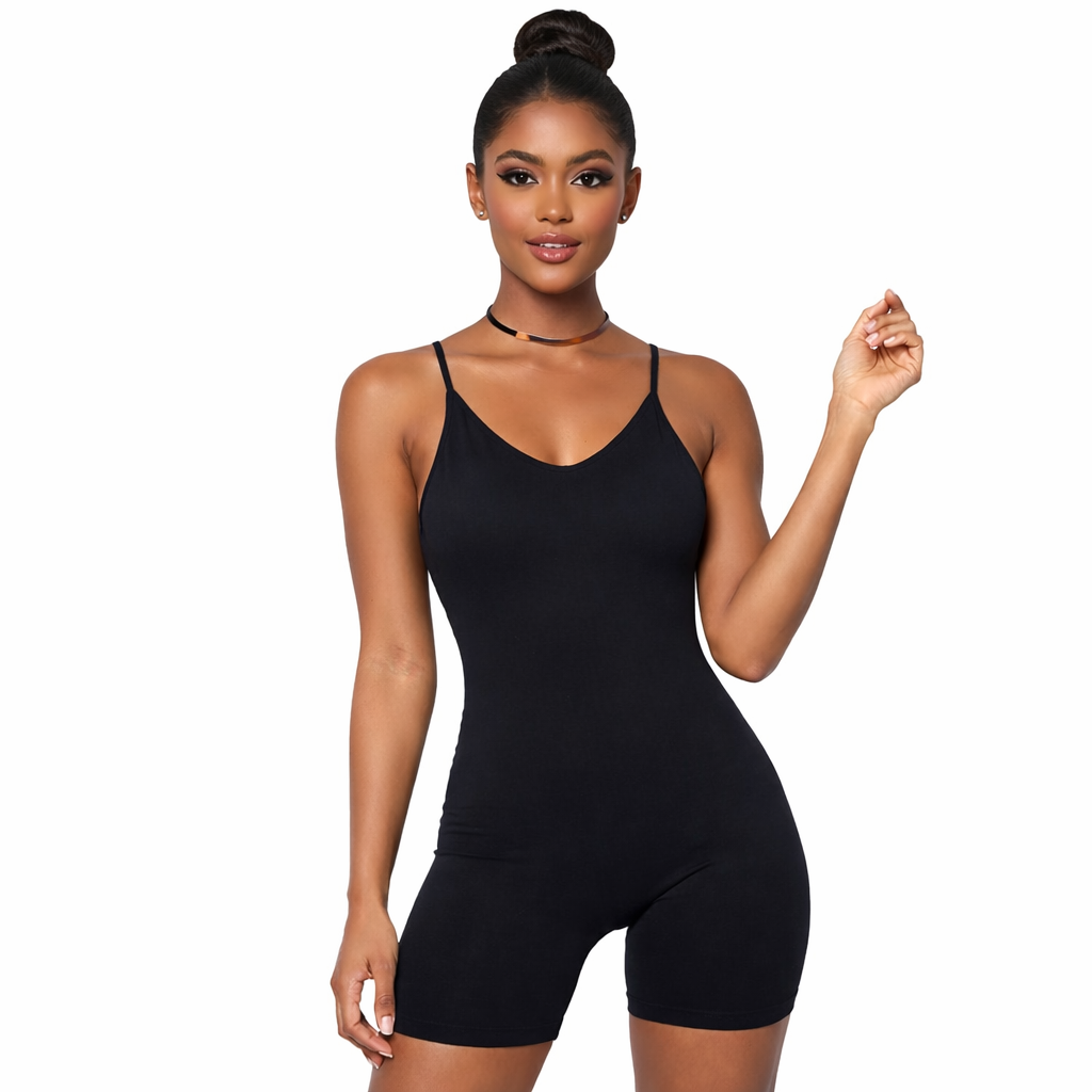 Woman wearing a black bodysuit on a white background