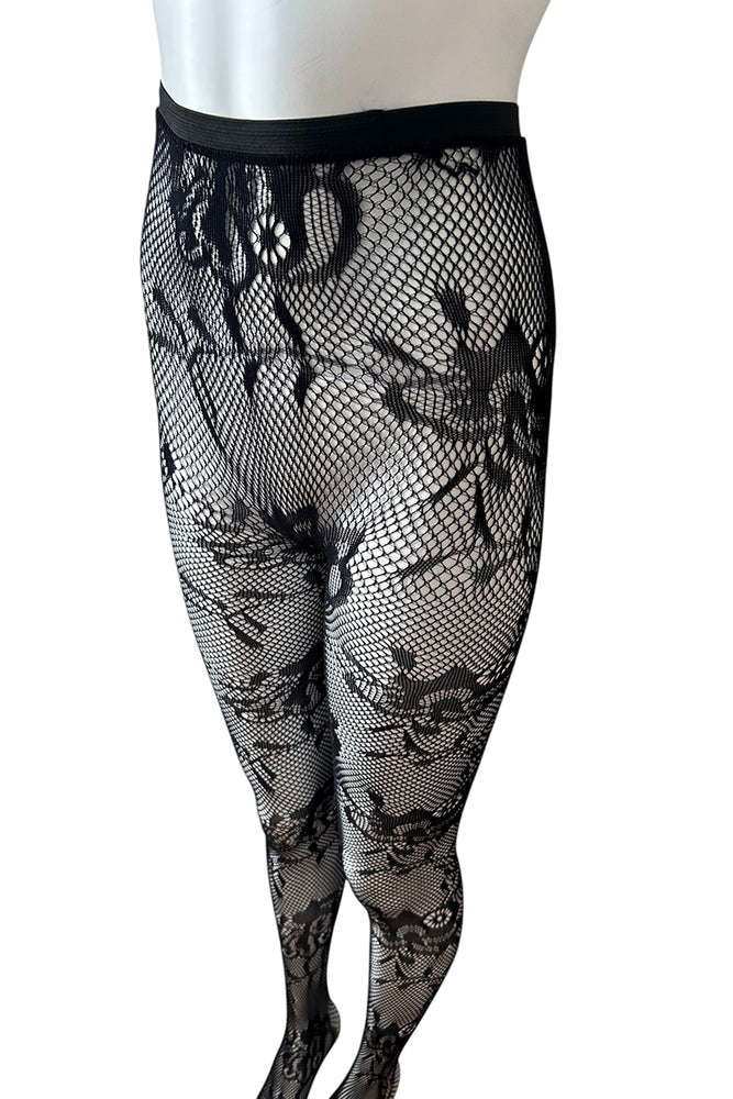 
                      
                        Black fishnet tights with skull design on a white background
                      
                    