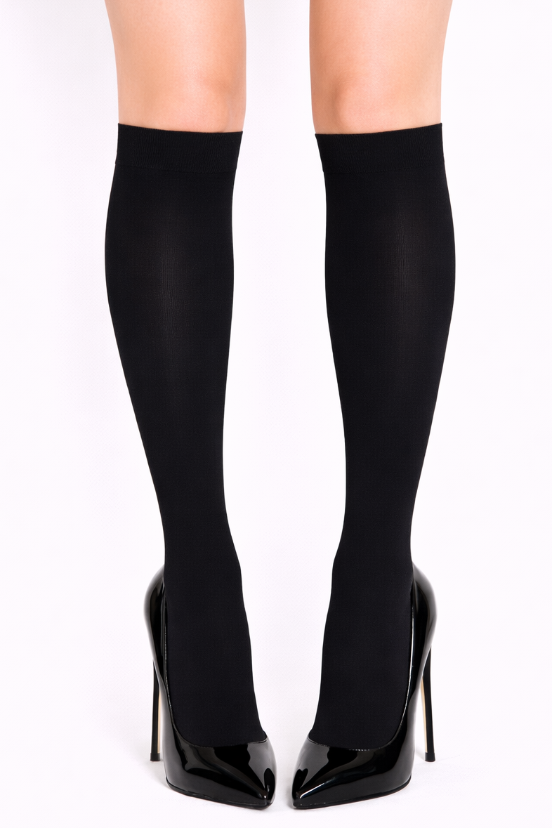 Black knee-high boots with high heels on a white background