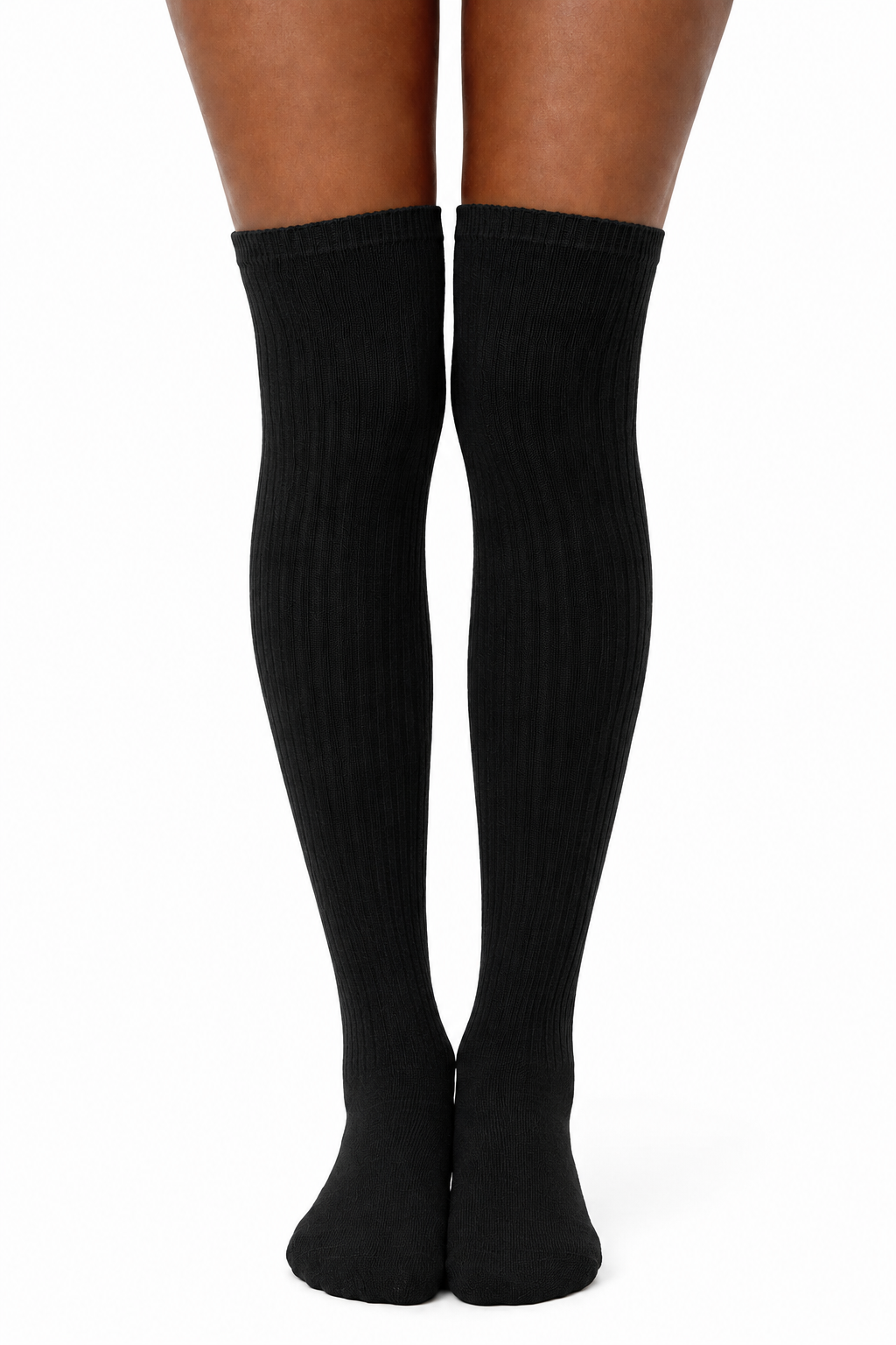 A pair of black ribbed over-the-knee socks worn on legs, shown from the back against a plain white background.